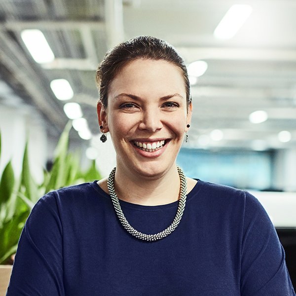 portrait-of-a-young-designer-standing-in-an-office-MX6TE8X
